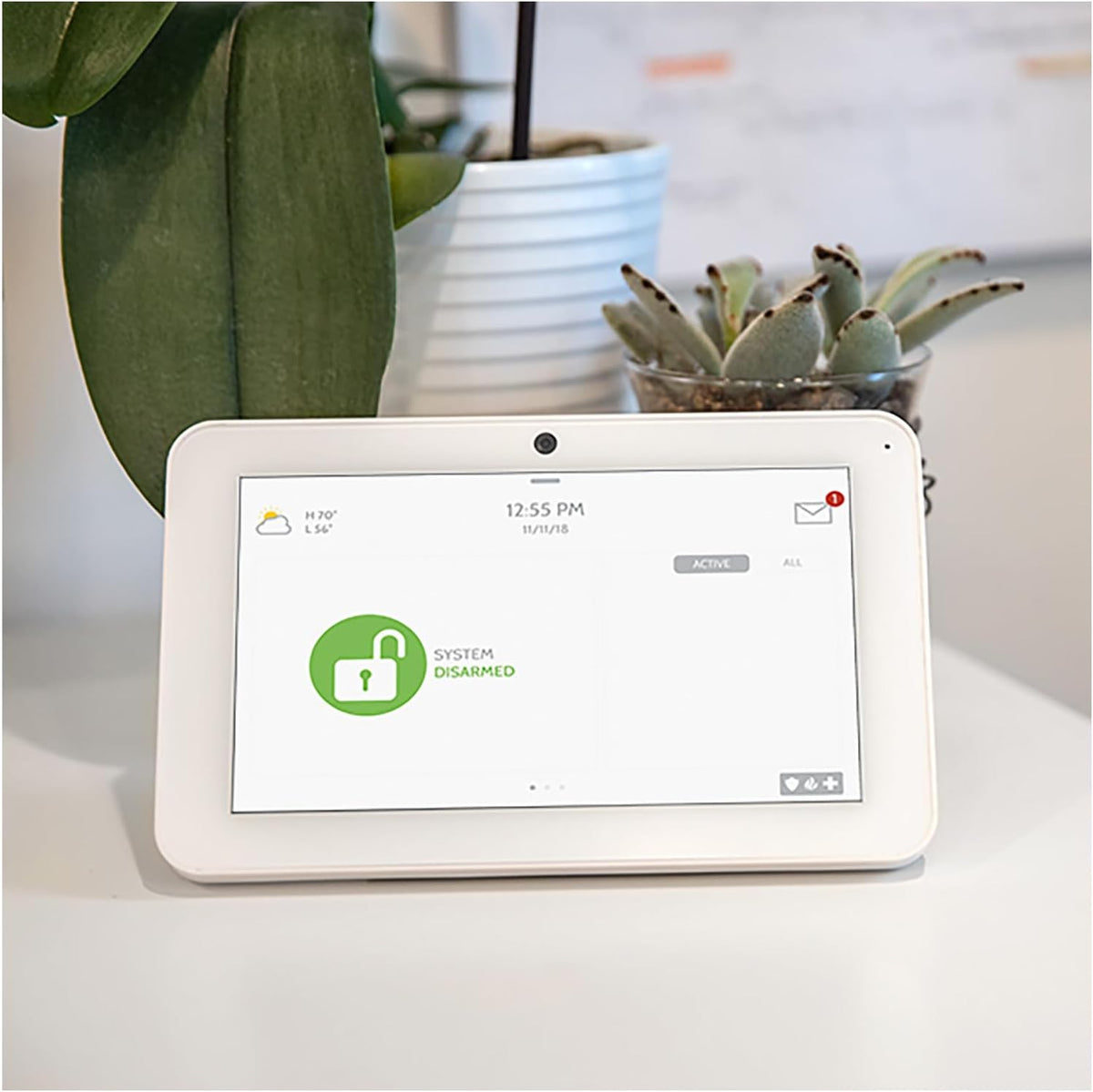 qolsys qw9104-840 iq remote shown in use