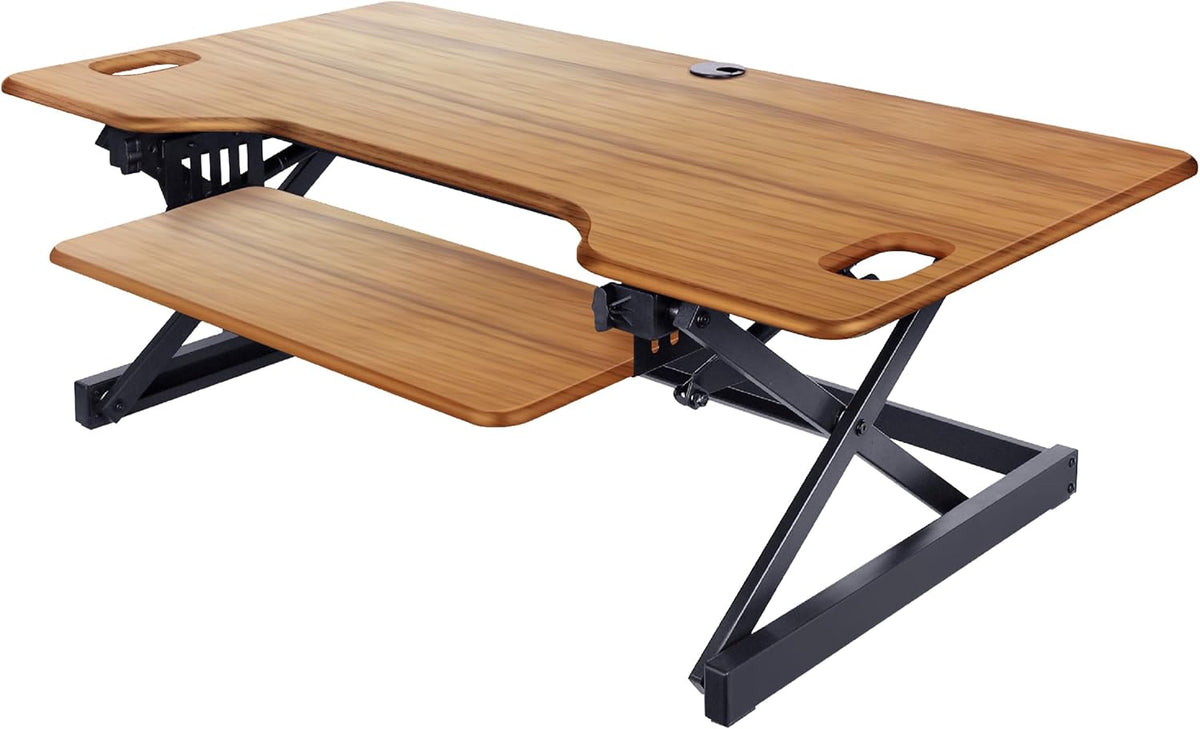 rocelco 46" large height adjustable standing desk converter on a desk or shelf