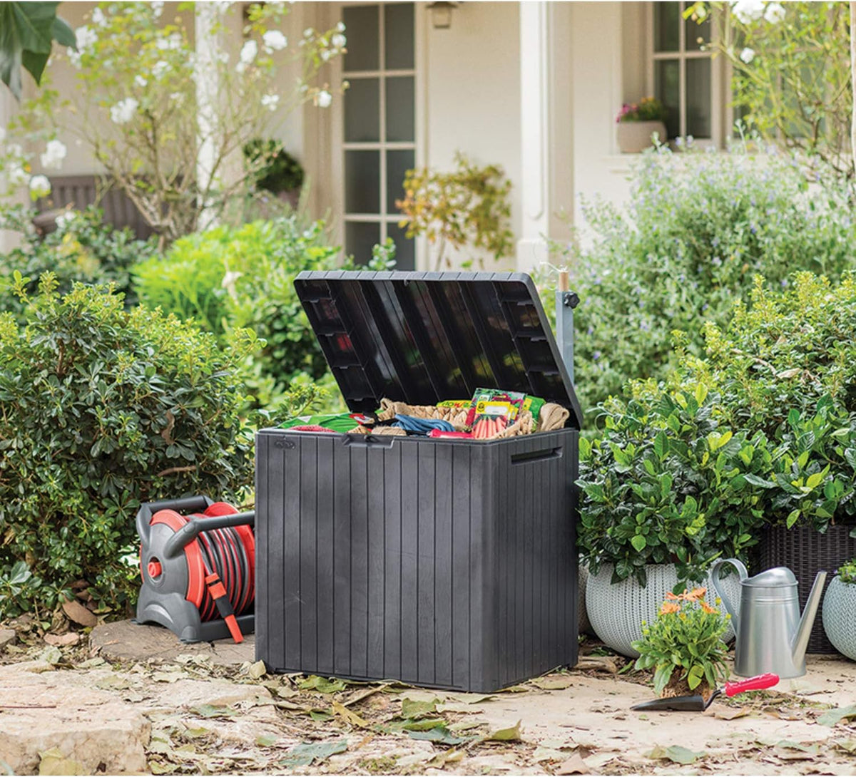 curver garden storage box 113 litre low temperature shown in use