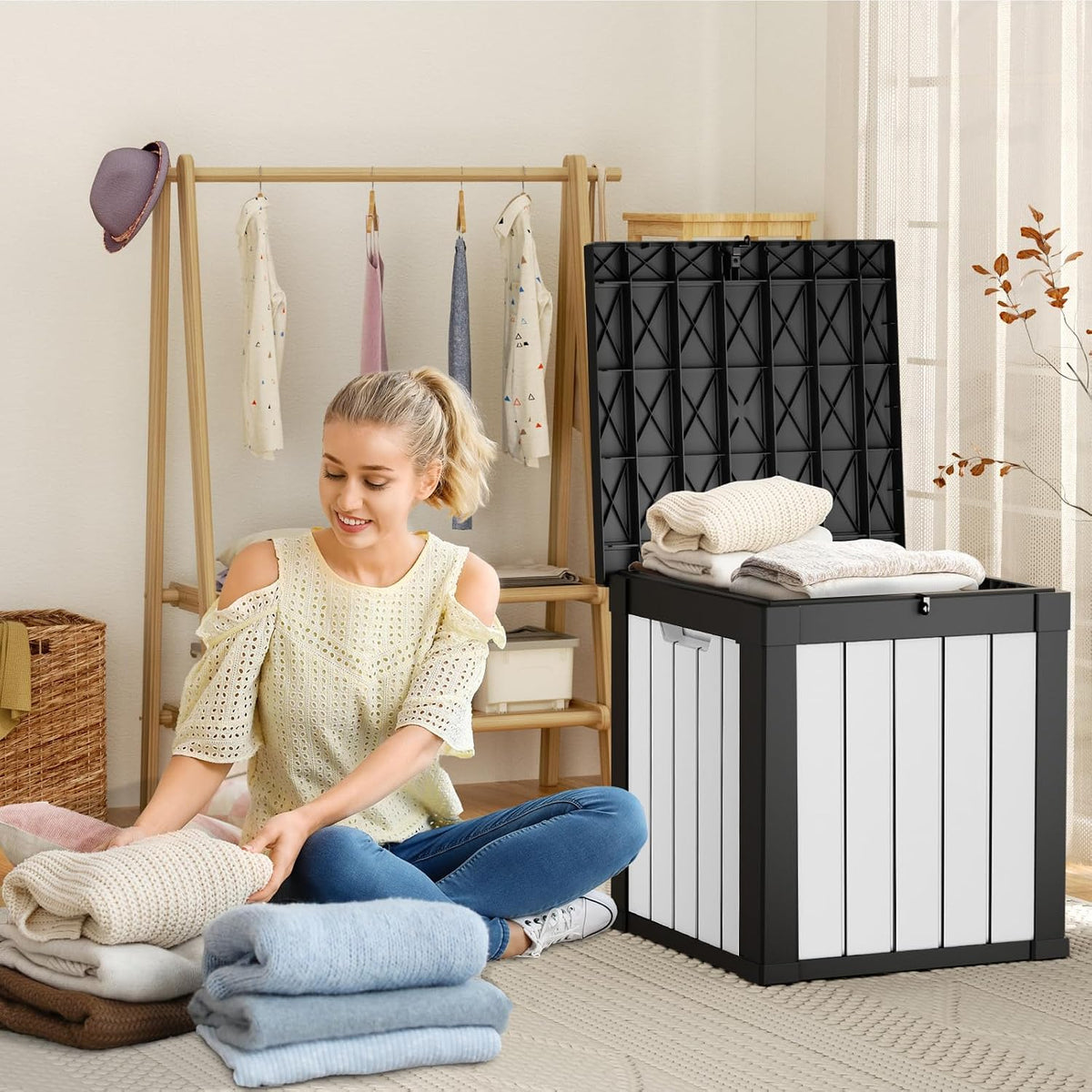 rojik 50 gallon resin deck box, lockable waterproof shown in use