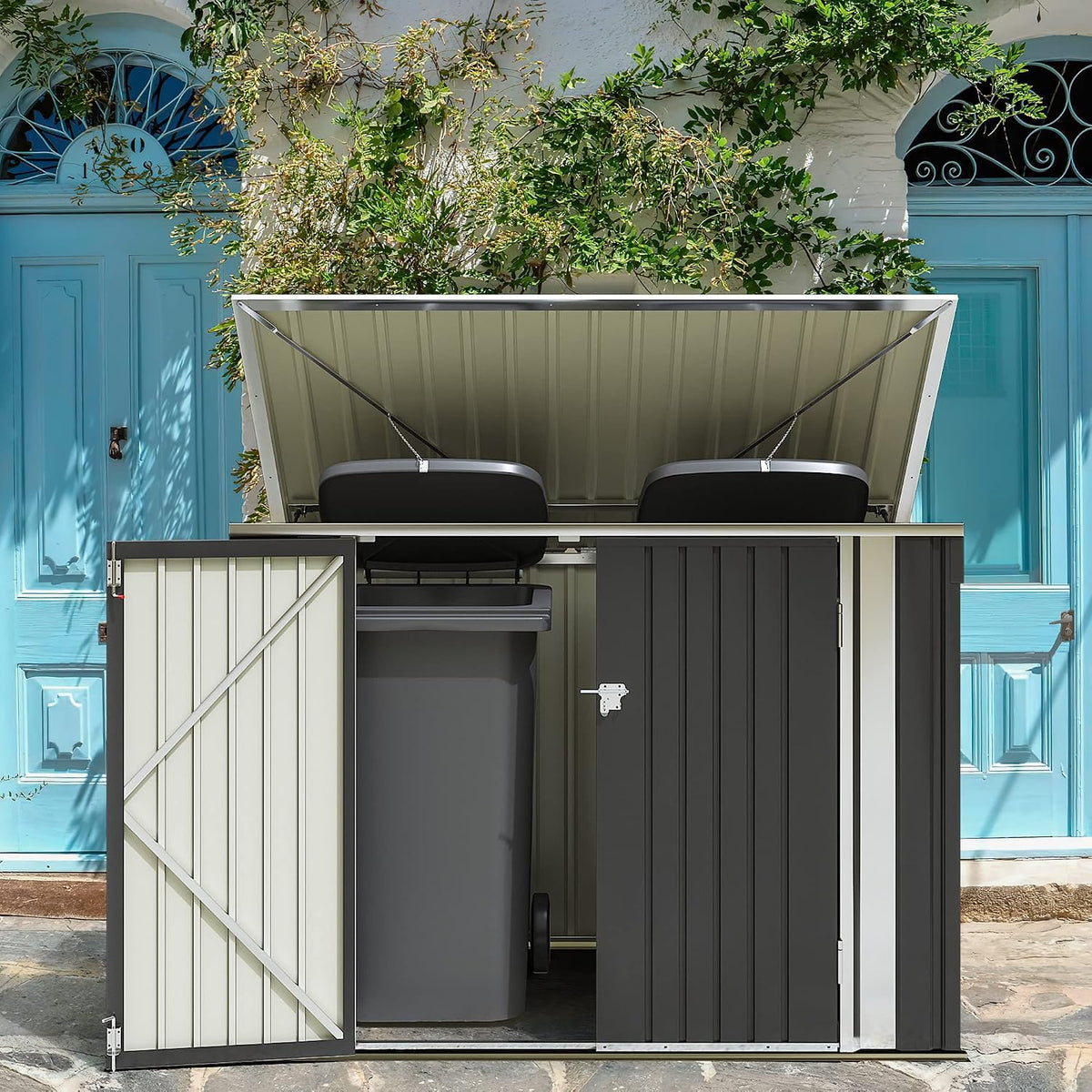 greesum 5.8x3.3 ft outdoor storage shed, black shown in use