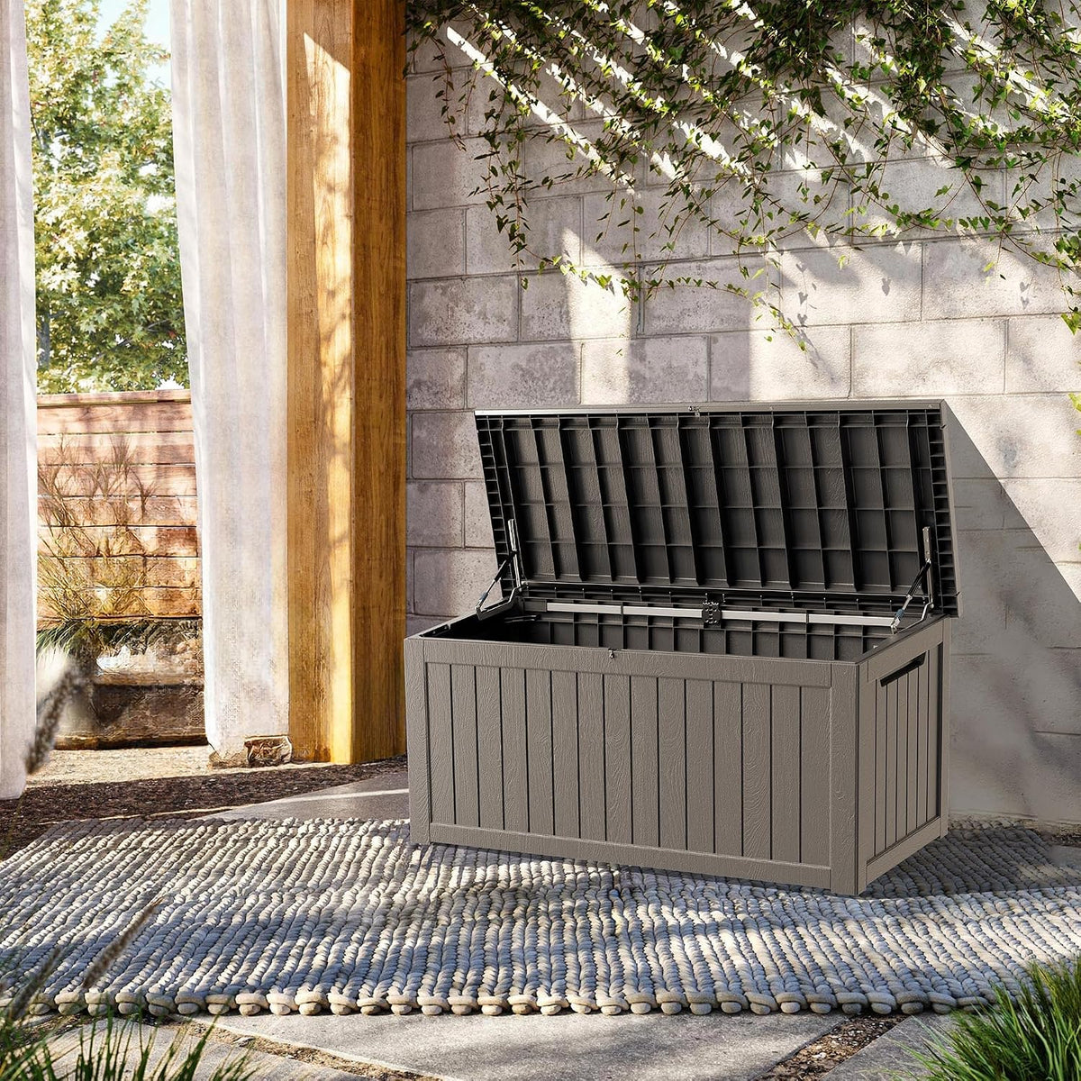 outdoor storage box, 270 gallon waterproof deck box shown in use